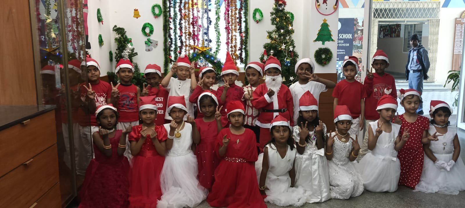 Students celebrating Christmas - image 8