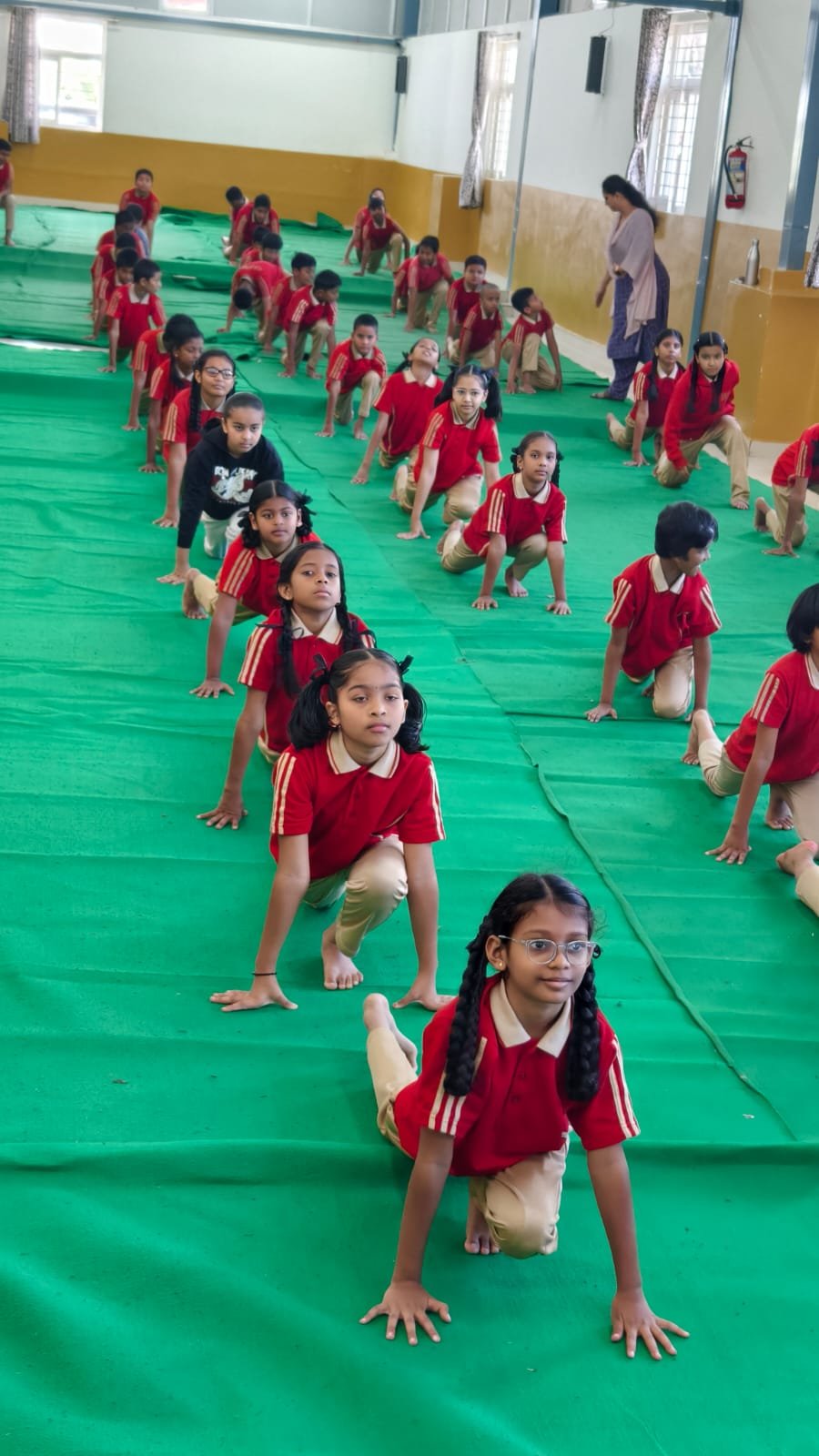 Students performing yoga poses on International Yoga Day 2026
