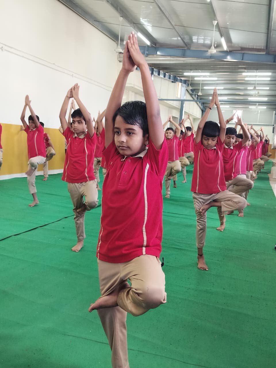 Students performing yoga poses on International Yoga Day 2026